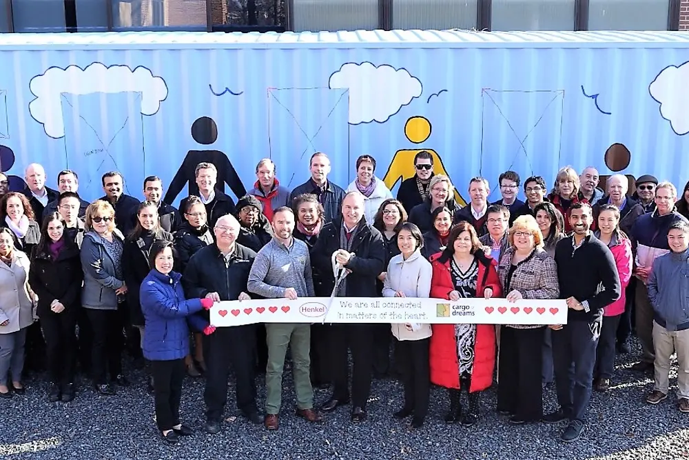 Bridgewater employees celebrate the completion of the Cargo of Dreams construction 